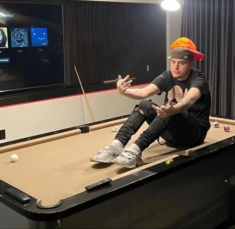 Yeat outfit in Palm Angels, New Era, and Balenciaga, 2022