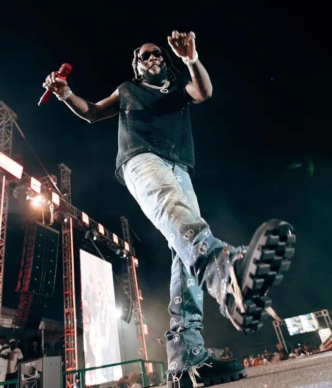 Burna Boy outfit in Gucci, Louis Vuitton, and Prada, 2024