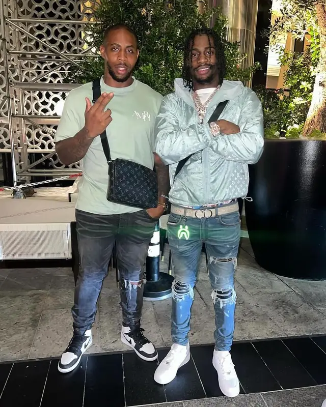 Russ Millions outfit in Louis Vuitton, Amiri, and Dior, 2024