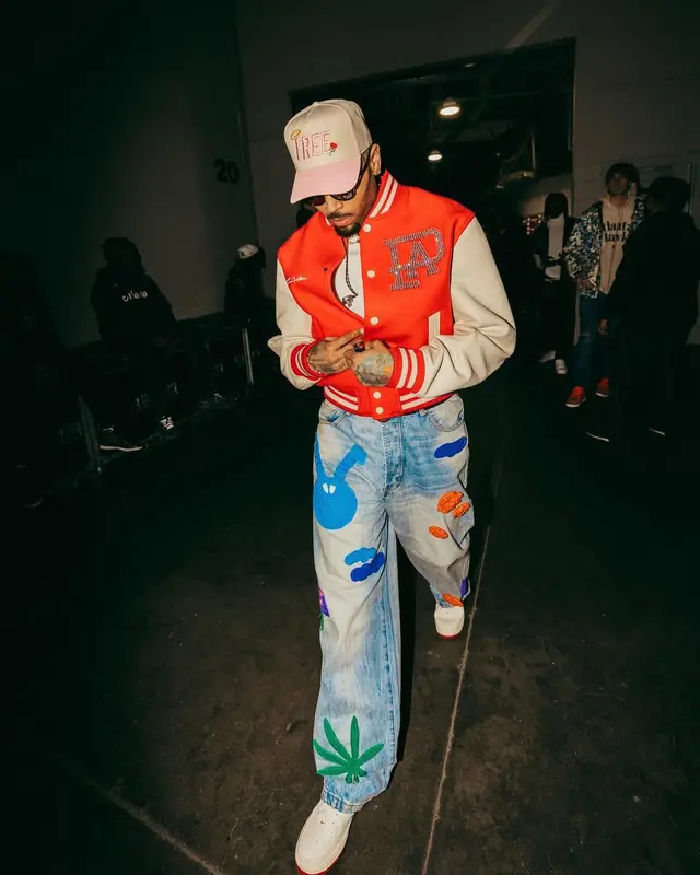 Chris Brown outfit in Louis Vuitton, Burberry, and Pheit, 2024