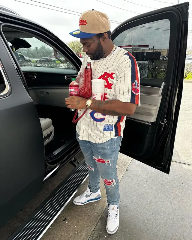 Peezy outfit in Amiri, Jordan, and Goyard, 2024