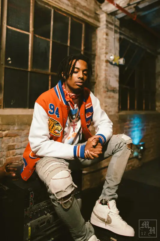 Playboi Carti outfit in Saint Laurent, Supreme, and Louis Vuitton, 2017