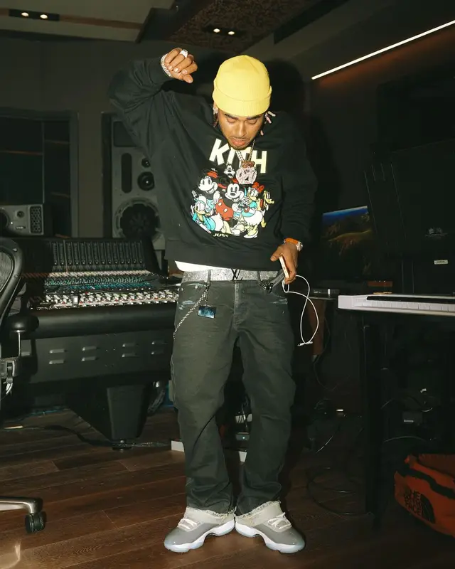 Ozuna outfit in Kith, Louis Vuitton, and Disney, 2024