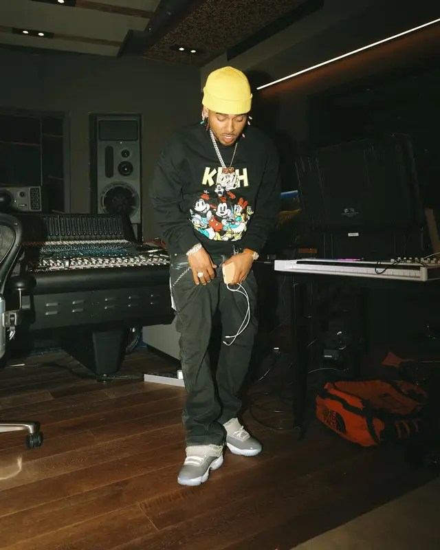 Ozuna outfit in Kith, Louis Vuitton, and Disney, 2024