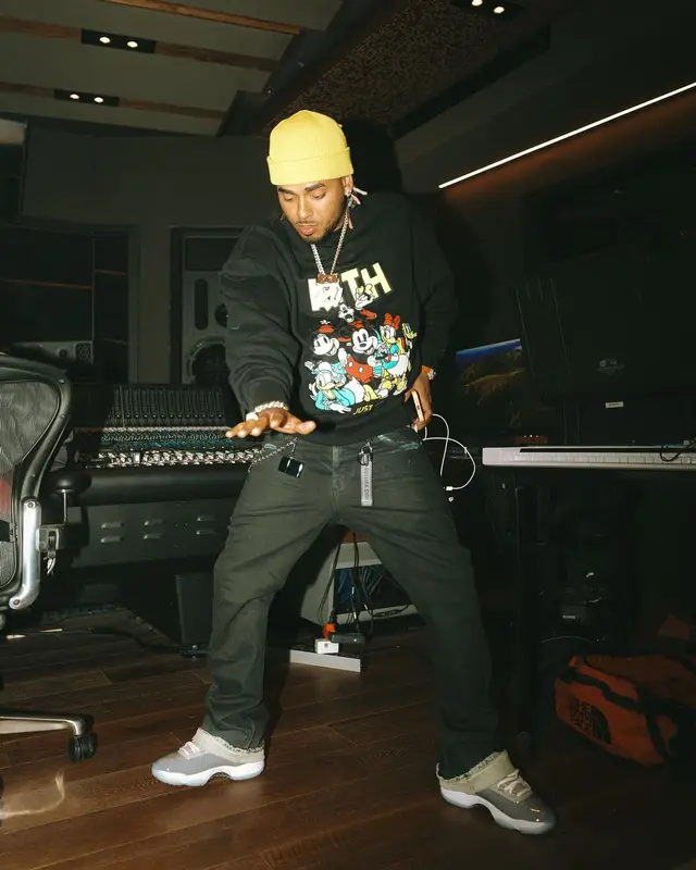 Ozuna outfit in Kith, Louis Vuitton, and Disney, 2024