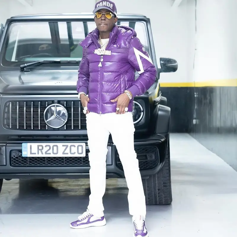 Bobby Shmurda outfit in Moncler, Prada, and Pandemonium Clothing Club, 2024