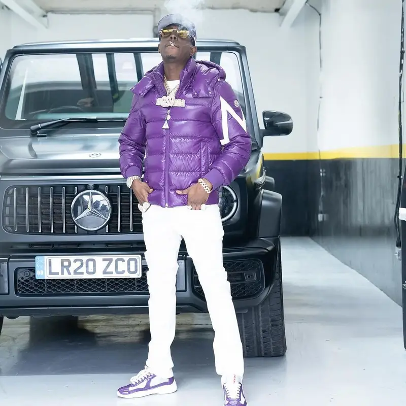 Bobby Shmurda outfit in Moncler, Prada, and Pandemonium Clothing Club, 2024