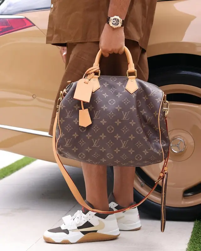 DJ Khaled outfit in Bottega Veneta and Louis Vuitton, 2024