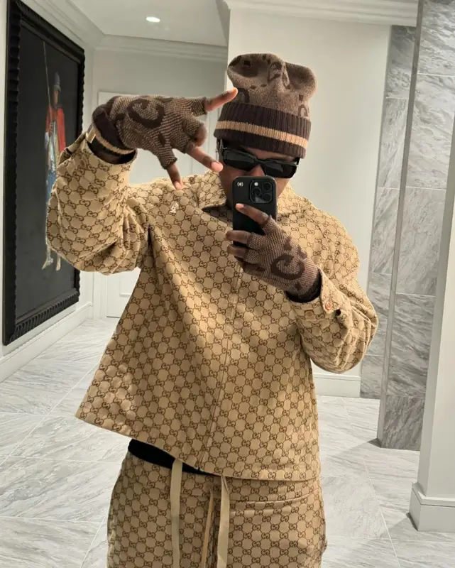 DaBaby outfit in Nike and Gucci, 2024