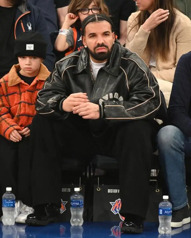 Drake outfit in Timberland and Veneda Carter, 2024