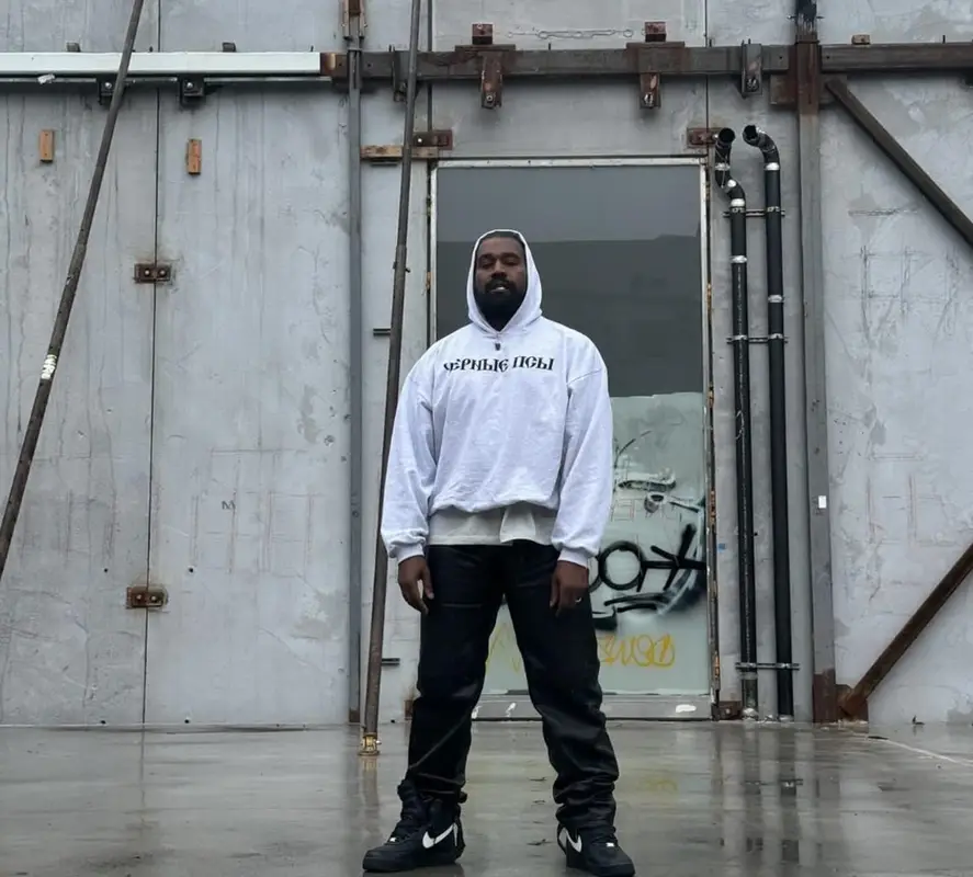 Kanye West outfit in Yeezy, Gosha Rubchinskiy, and Vlone, 2024