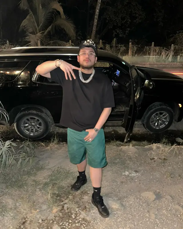 Jesus Ortiz Paz outfit in Louis Vuitton, Amiri, and Nike, 2024