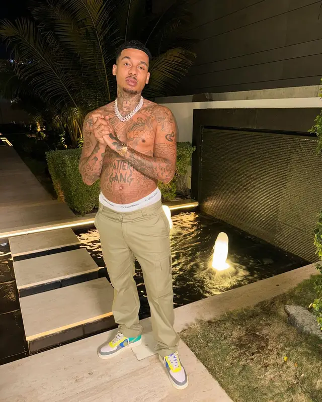 Fredo outfit in Louis Vuitton, Nike, and Calvin Klein, 2024