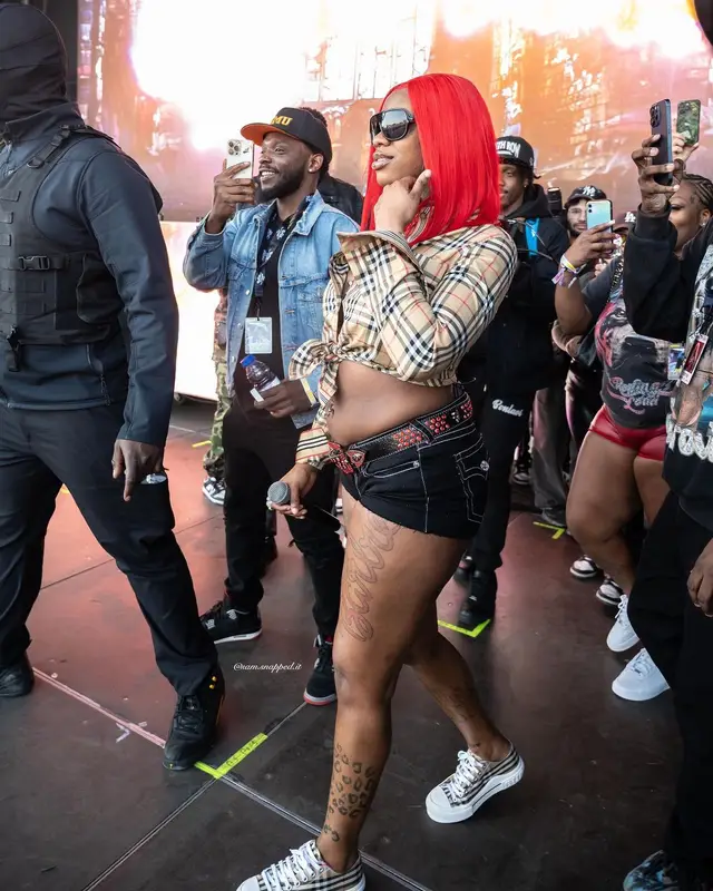 Sexyy Red outfit in Burberry, True Religion, and B.B. Simon, 2024