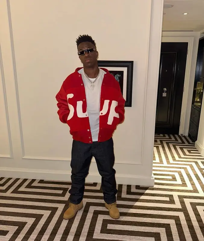 Vinicius Jr outfit in Supreme, Timberland, and Louis Vuitton, 2024