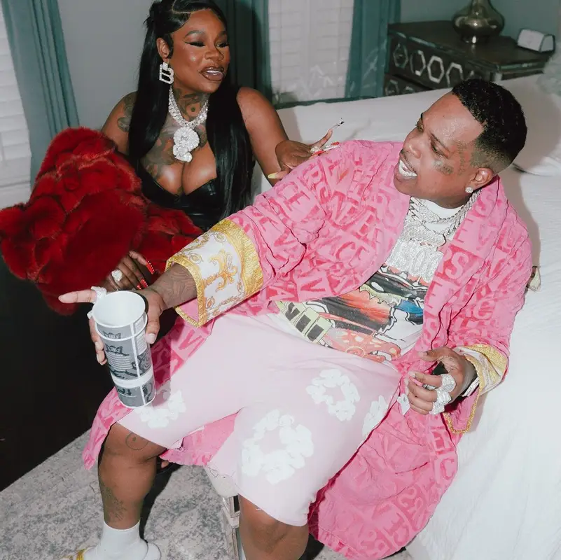 Finesse2tymes outfit in Denim Tears and Versace, 2024