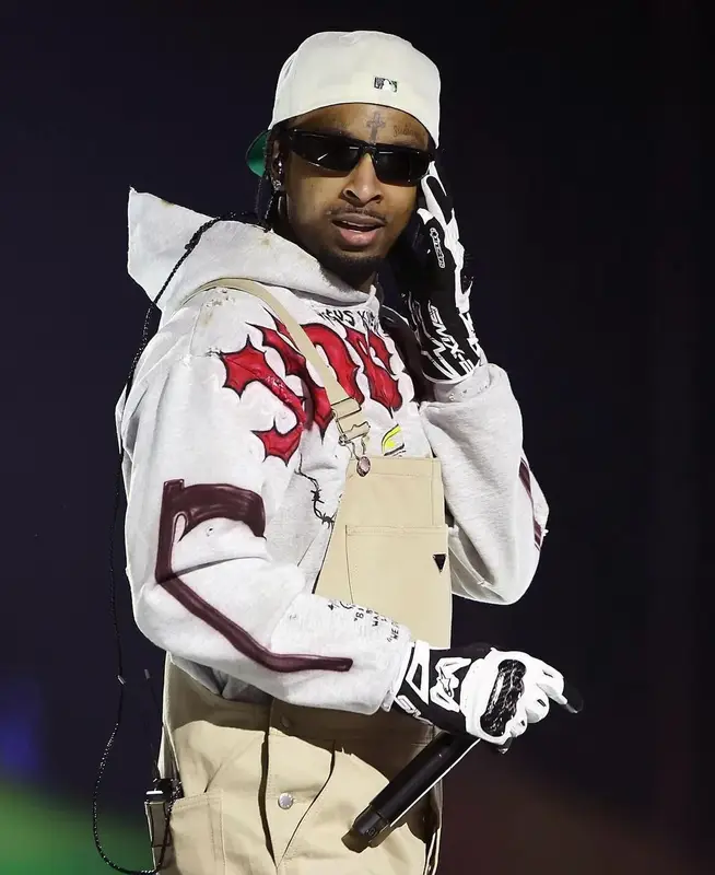 21 Savage outfit in Prada and Alpinestars, 2024