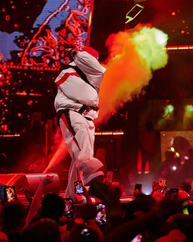 DaBaby outfit in Balenciaga, Nike, and New Era, 2024