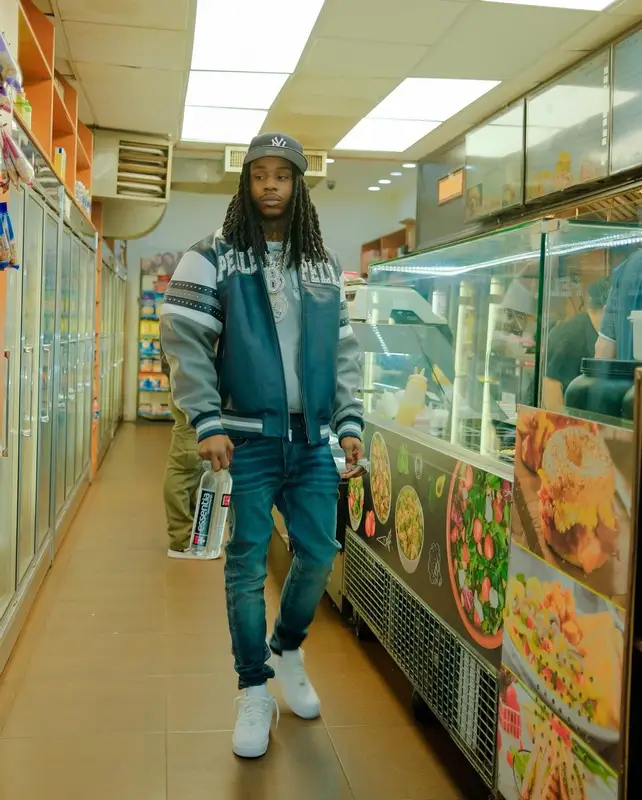 Polo G outfit in Amiri, Nike, and New Era, 2024