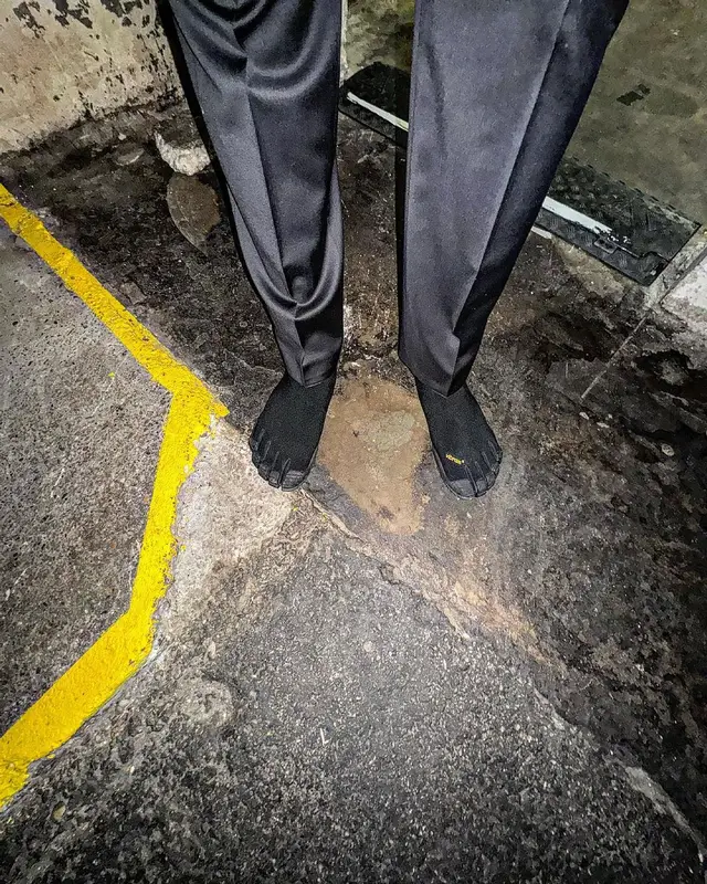 Lil Tracy outfit in Vivienne Westwood, Tom Ford, and Vibram, 2024