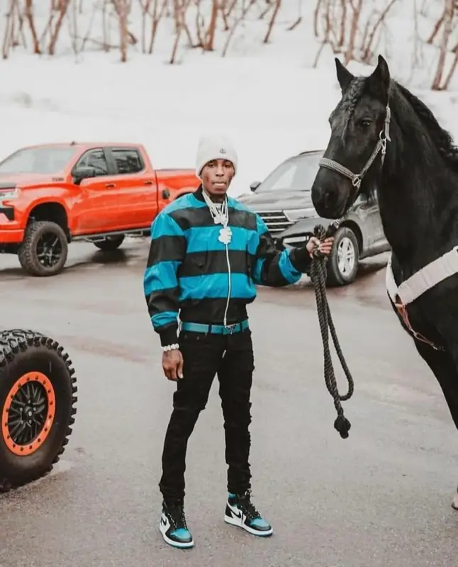 NBA YoungBoy outfit in Dries Van Noten, Nike, and Moncler, 2024