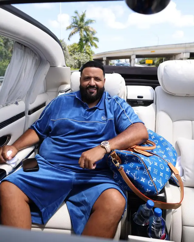 DJ Khaled outfit in Sergio Tacchini, Jordan, and Louis Vuitton, 2024
