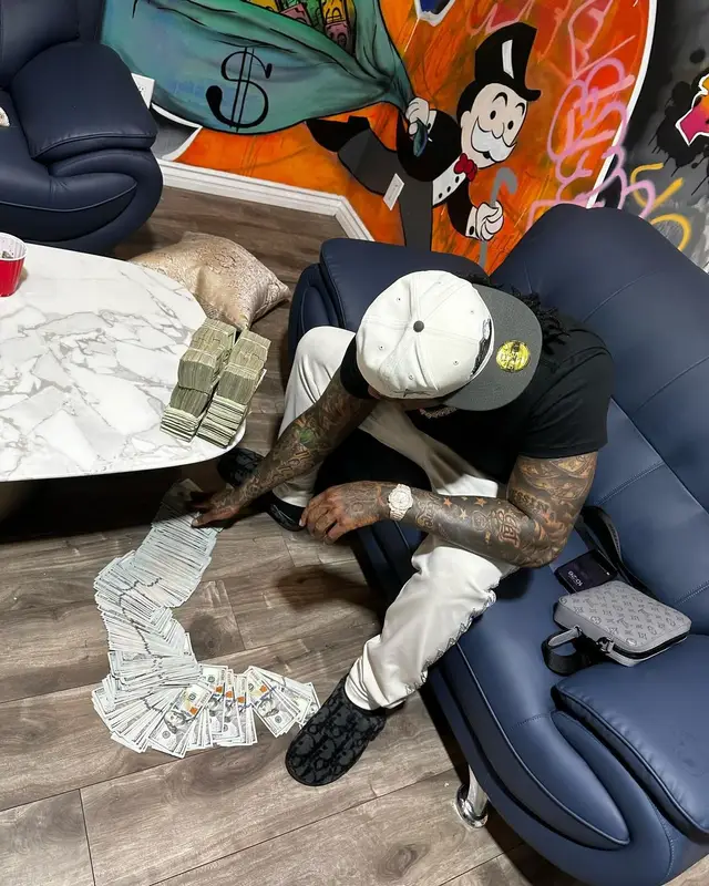 Moneybagg Yo outfit in Louis Vuitton, New Era, and Dior, 2024