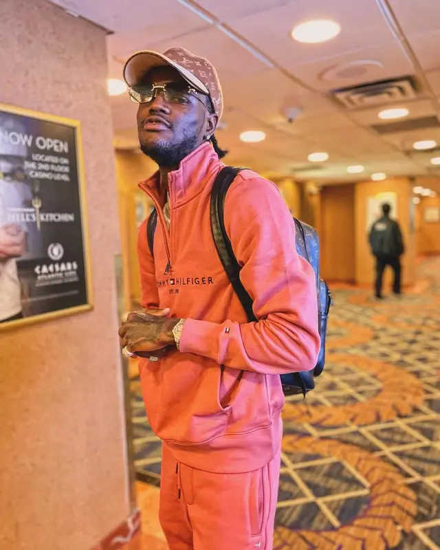 DC YoungFly outfit in Tommy Hilfiger, Bally, and Louis Vuitton, 2024