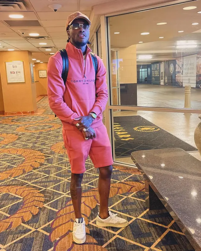 DC YoungFly outfit in Tommy Hilfiger, Bally, and Louis Vuitton, 2024