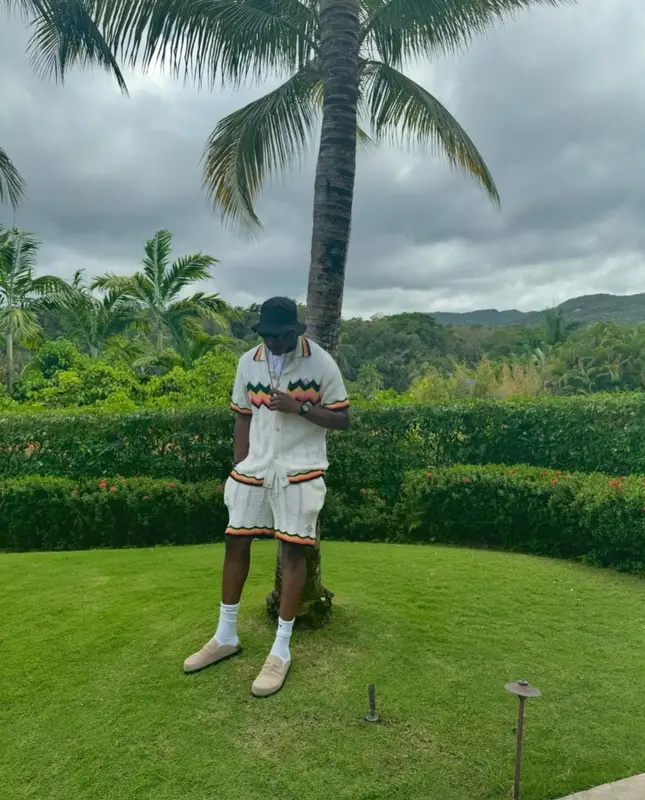 Rob49 outfit in Casablanca, Nike, and Versace, 2024
