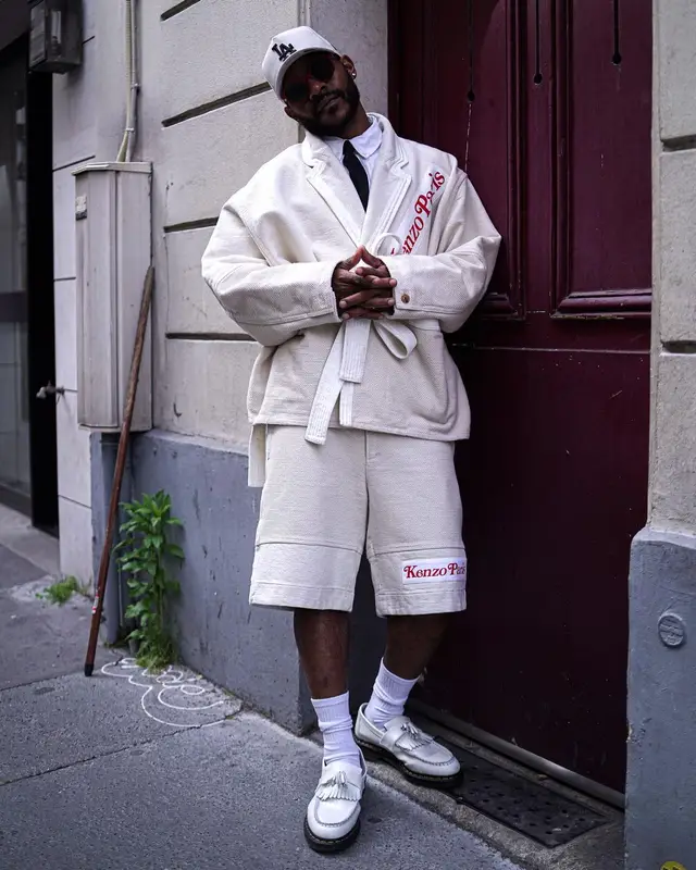 Eric Bellinger outfit in Kenzo, Dr. Martens, and New Era, 2024