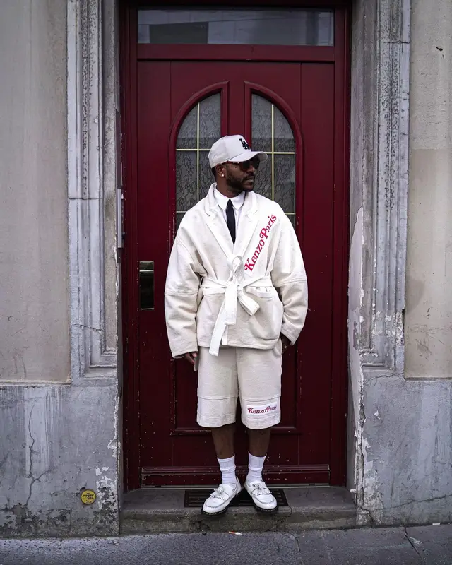 Eric Bellinger outfit in Kenzo, Dr. Martens, and New Era, 2024