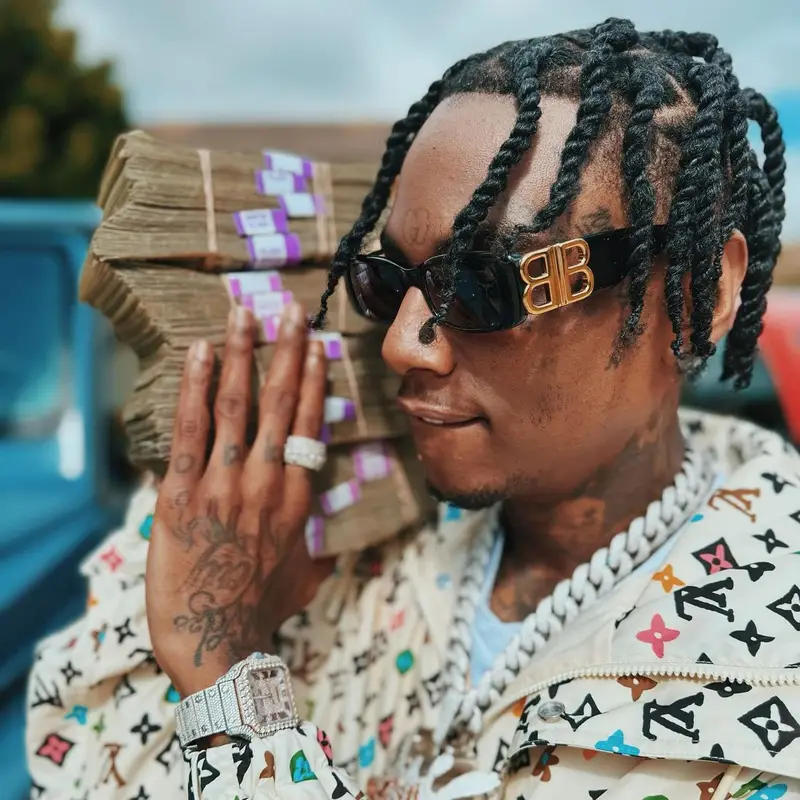 Soulja Boy outfit in Louis Vuitton, Goyard, and Balenciaga, 2024