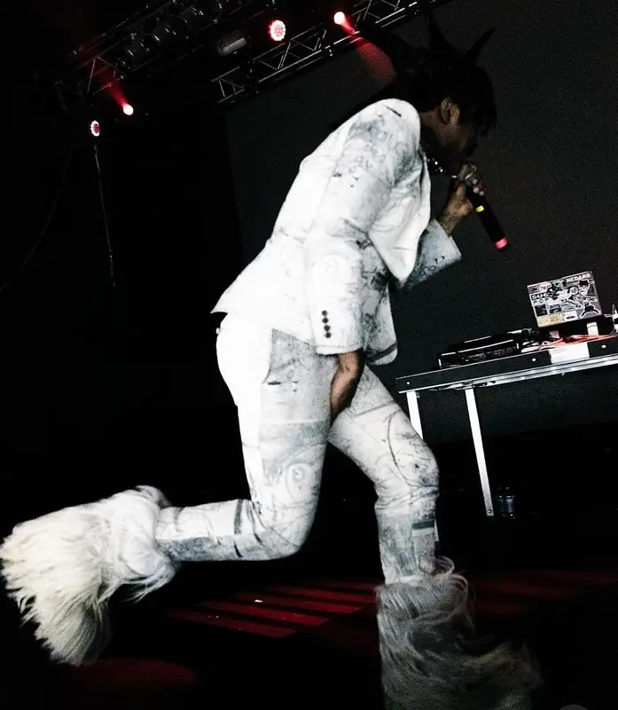 Lil Tracy outfit in Alexander McQueen, Rick Owens, and Moncler, 2024