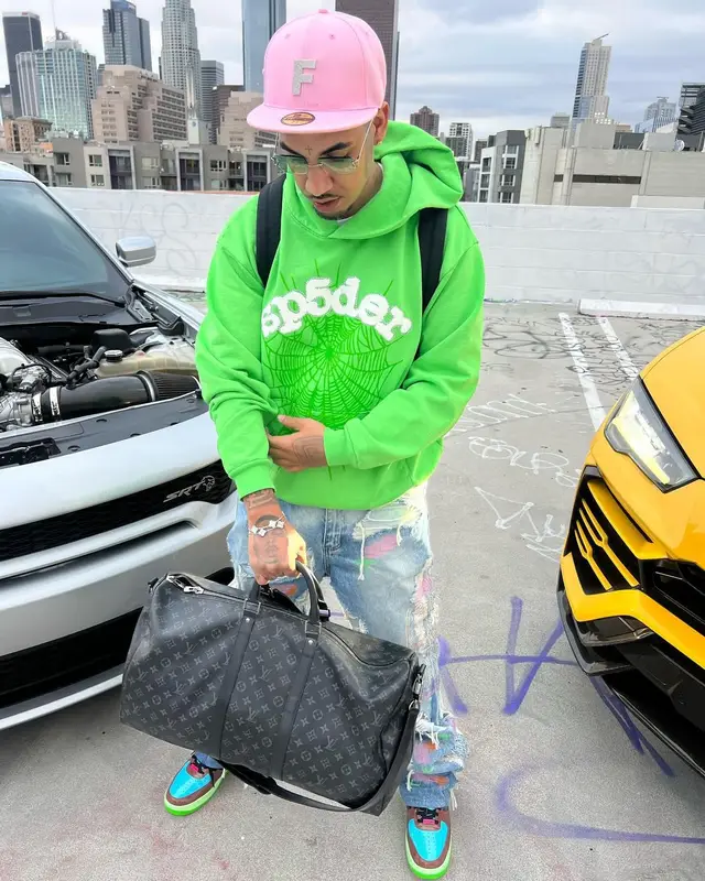 Fenix Flexin outfit in Cartier, New Era, and Fuck The Population, 2024