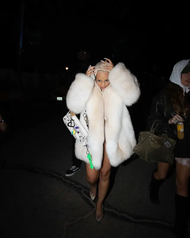 Doja Cat outfit in Balenciaga, Emporio Armani, and Louis Vuitton, 2024