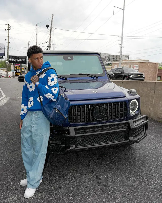 NLE Choppa outfit in Denim Tears, Kenzo, and Louis Vuitton, 2024
