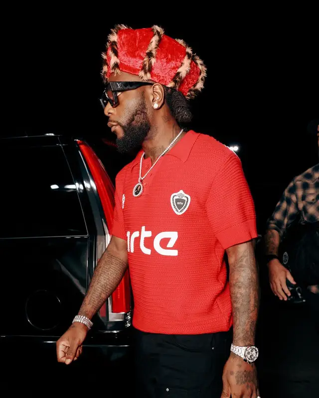Burna Boy outfit in Arte Antwerp, Clarks, and Louis Vuitton, 2024