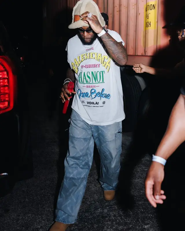 Burna Boy outfit in Balenciaga, Timberland, and Acne Studios, 2024