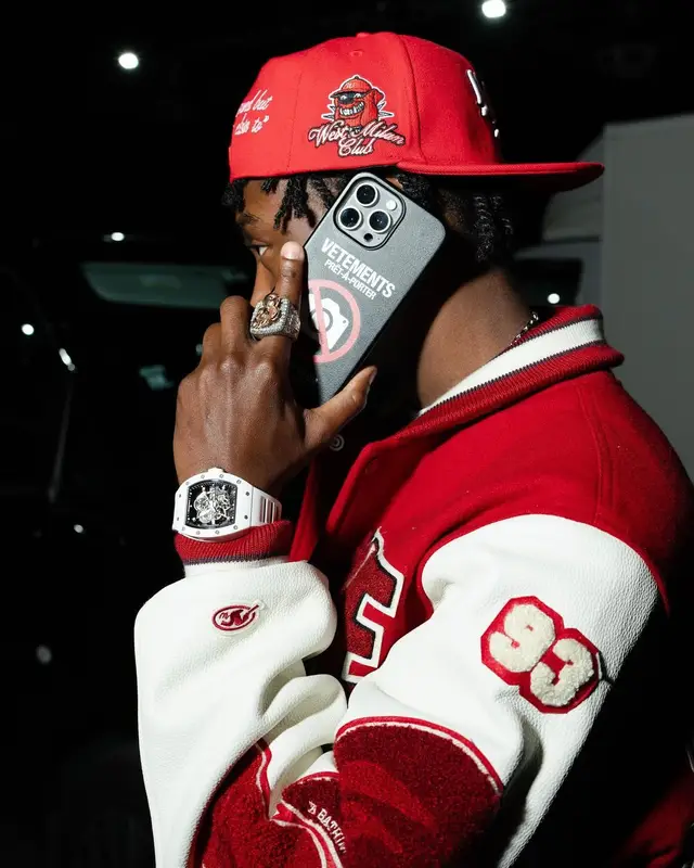 Lil Tjay outfit in Bape, Jordan, and Vetements, 2024