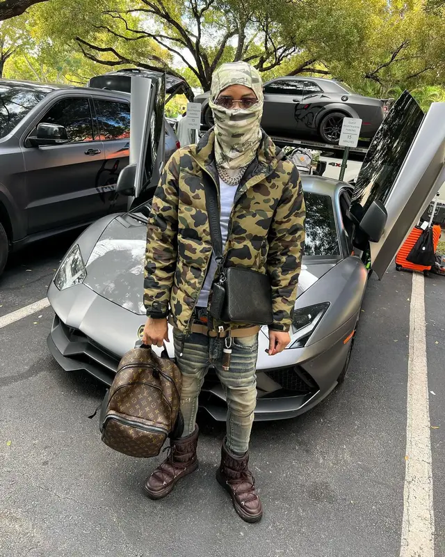 Lil Migo outfit in Bape, Dior, and Louis Vuitton, 2024