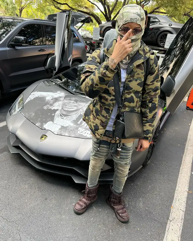 Lil Migo outfit in Bape, Dior, and Louis Vuitton, 2024