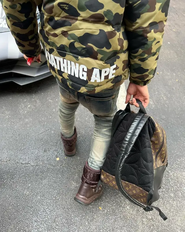 Lil Migo outfit in Bape, Dior, and Louis Vuitton, 2024
