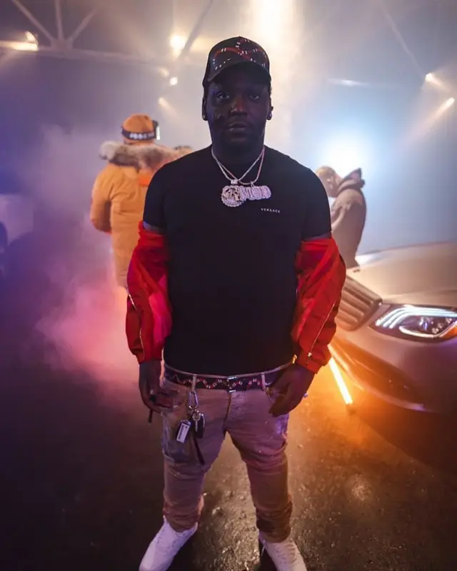 Rio Da Yung Og outfit in Versace, Nike, and Gucci, 2024