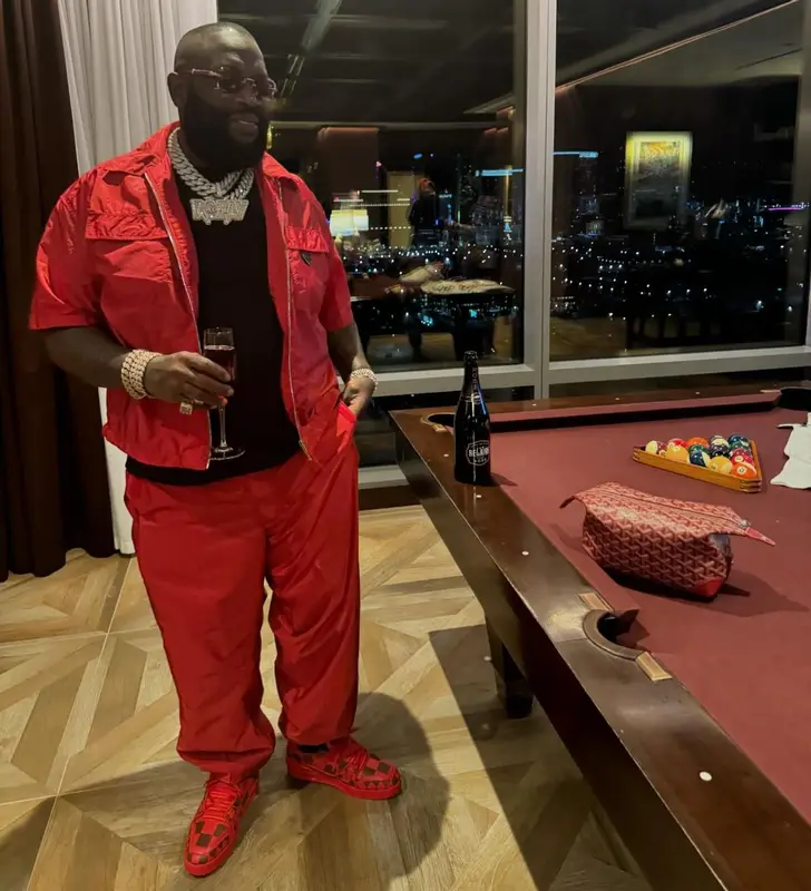 Rick Ross outfit in Prada, Louis Vuitton, and Goyard, 2024