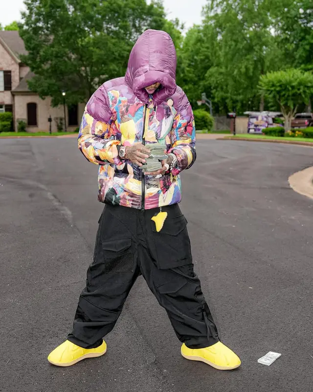NLE Choppa outfit in Canada Goose, Junya Watanabe, and KidSuper, 2024