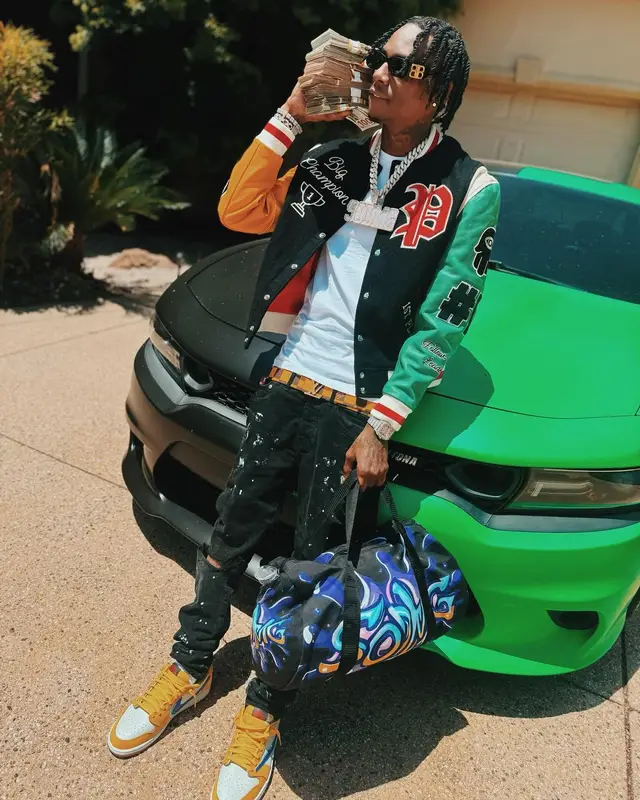 Soulja Boy outfit in Nike, Louis Vuitton, and Balenciaga, 2024