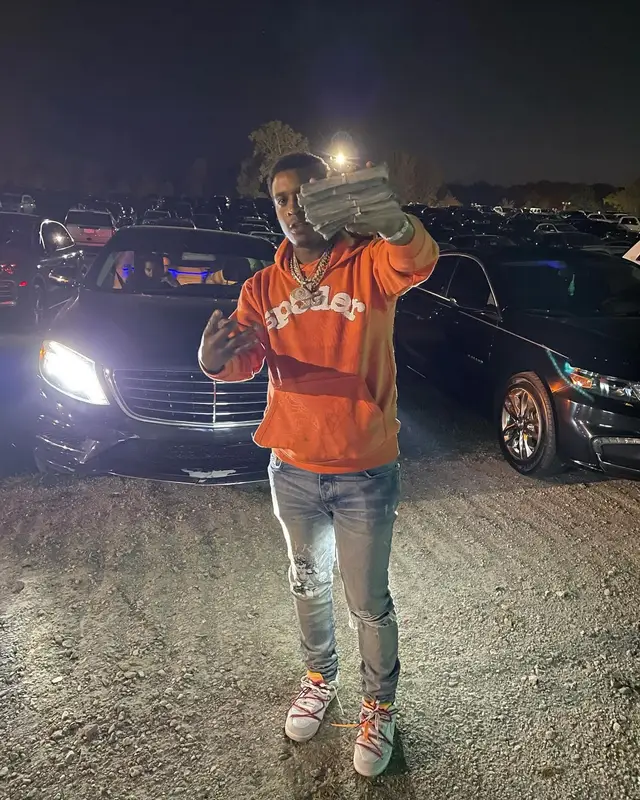 Baby Money outfit in Spider Worldwide, Amiri, and Nike, 2024