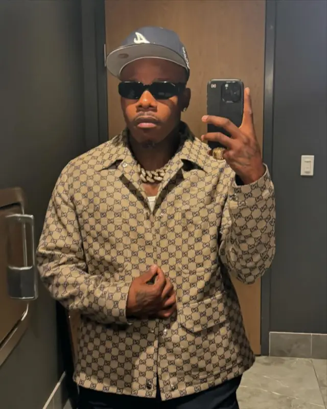 DaBaby outfit in Gucci, Prada, and New Era, 2024