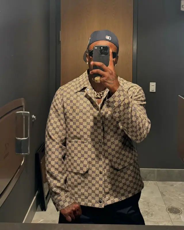 DaBaby outfit in Gucci, Prada, and New Era, 2024